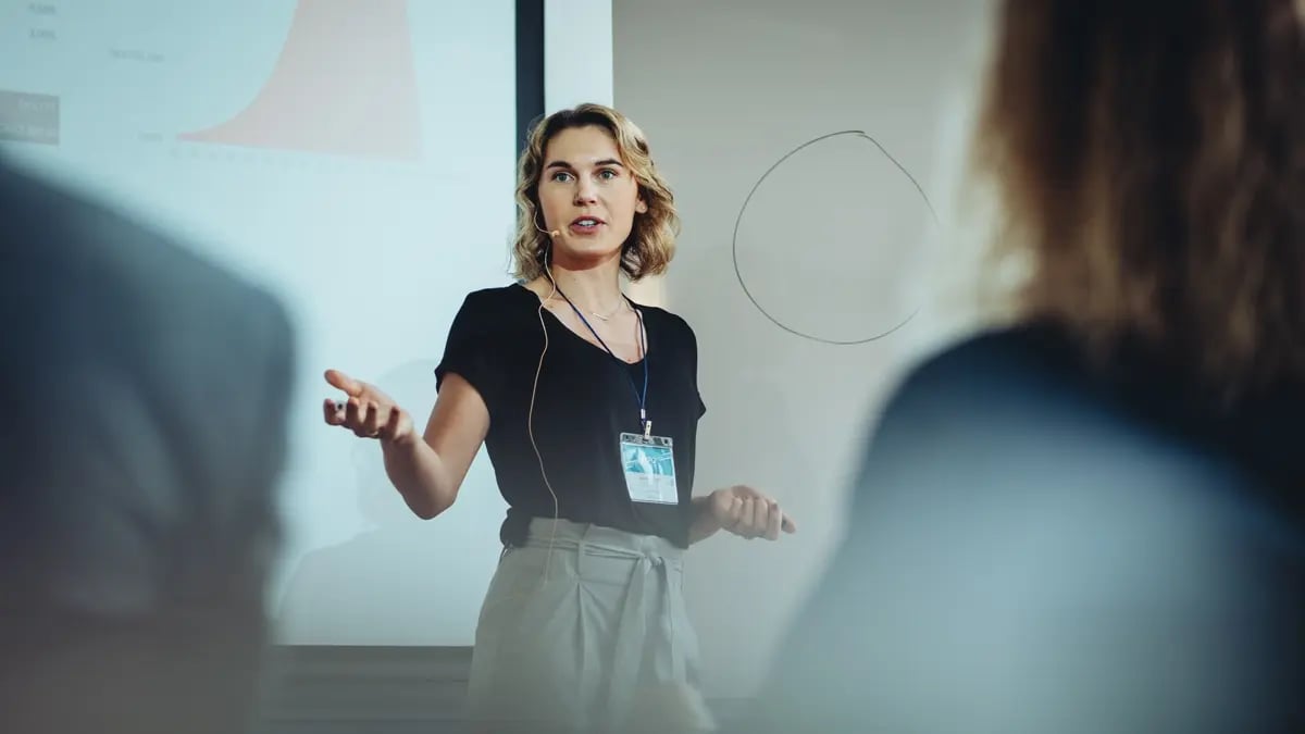 A speaker giving out a presentation.