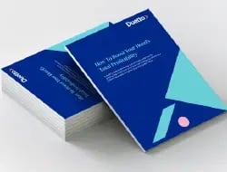 A book with a blue cover with the title of 'How to Boost Your Hotel’s Total Profitability'.