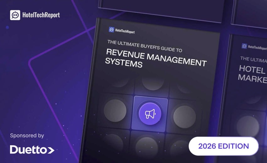Front cover of the 'Ultimate buyer's guide to revenue management systems' shown on an iPad.