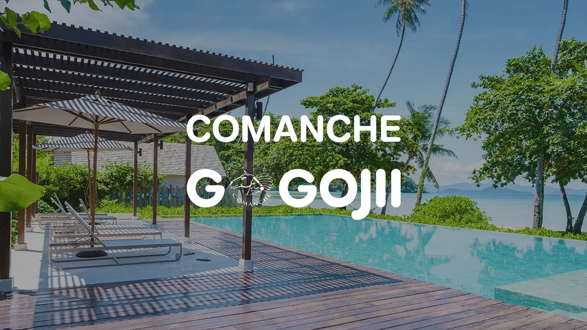 Comanche Gogojii logo superimposed on an image of an outdoor pool.